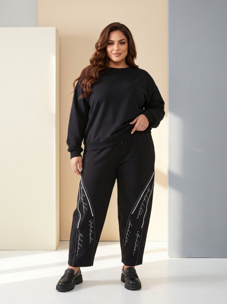 Pantaloni negri cu alb cu croială largă și talie cu elastic și șnur